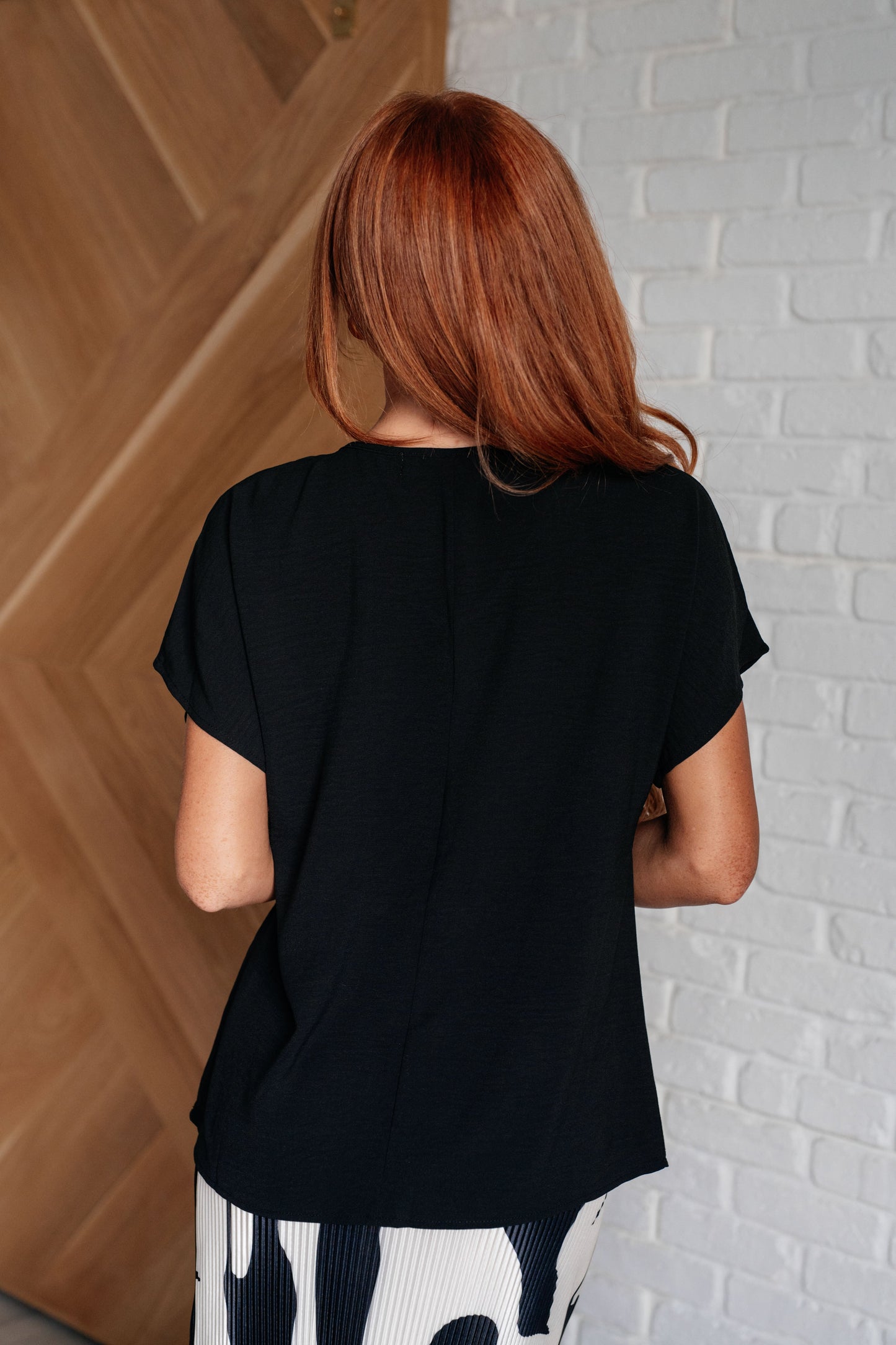 One Eleven North V-Neck Top in Black