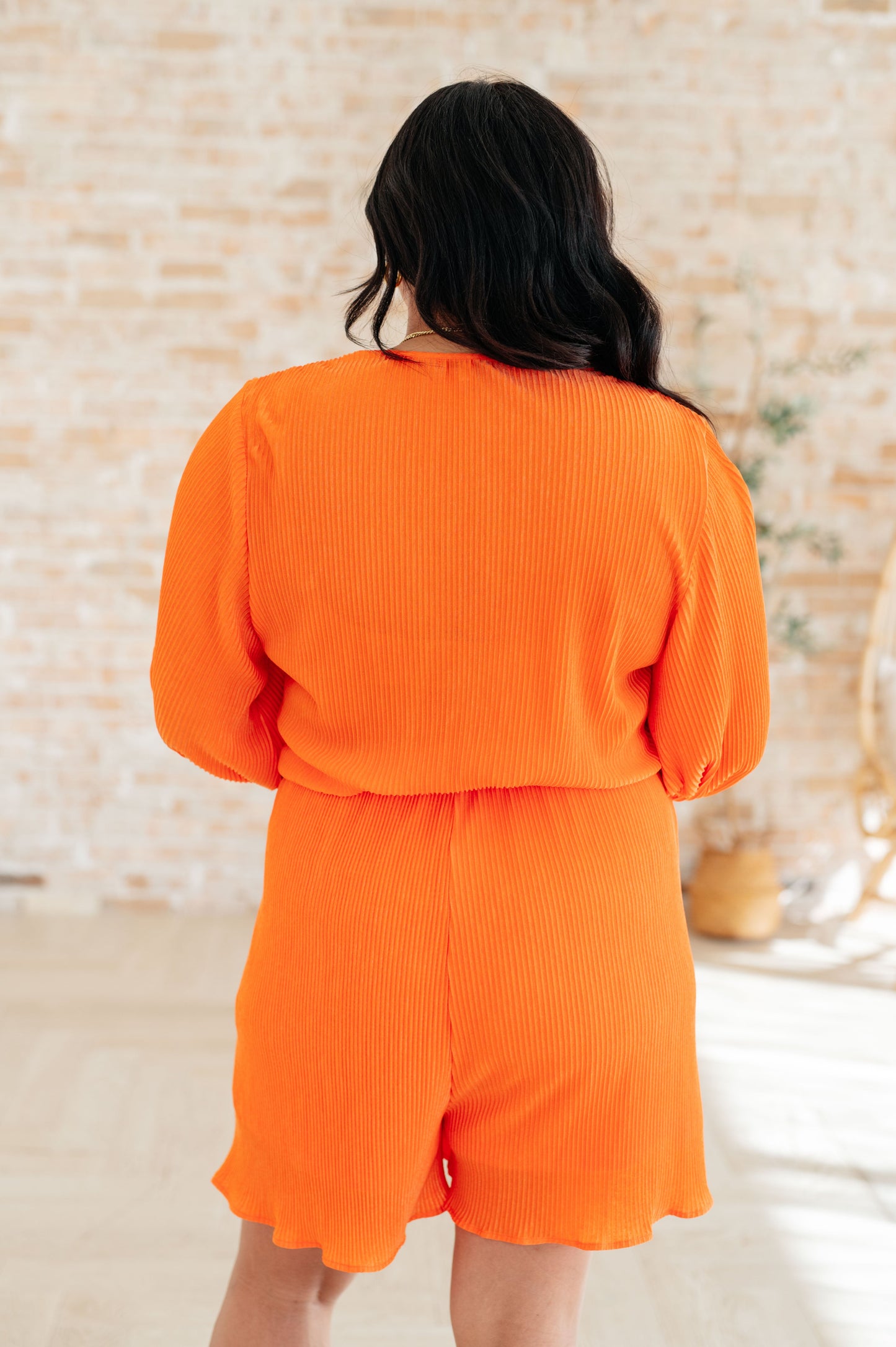 White Birch- Roll With me Romper in Tangerine